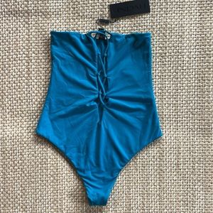 Indah “pip” one piece in real -NWT